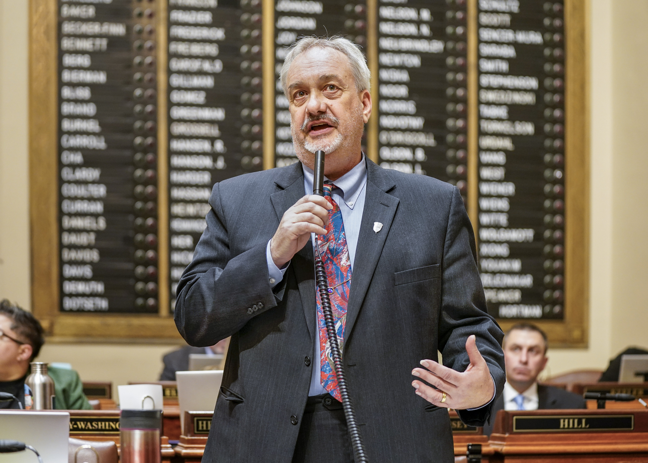 Rep. Rick Hansen introduces HF2310, the omnibus environment, natural resources, climate and energy finance bill on the House Floor April 17. (Photo by Catherine Davis)