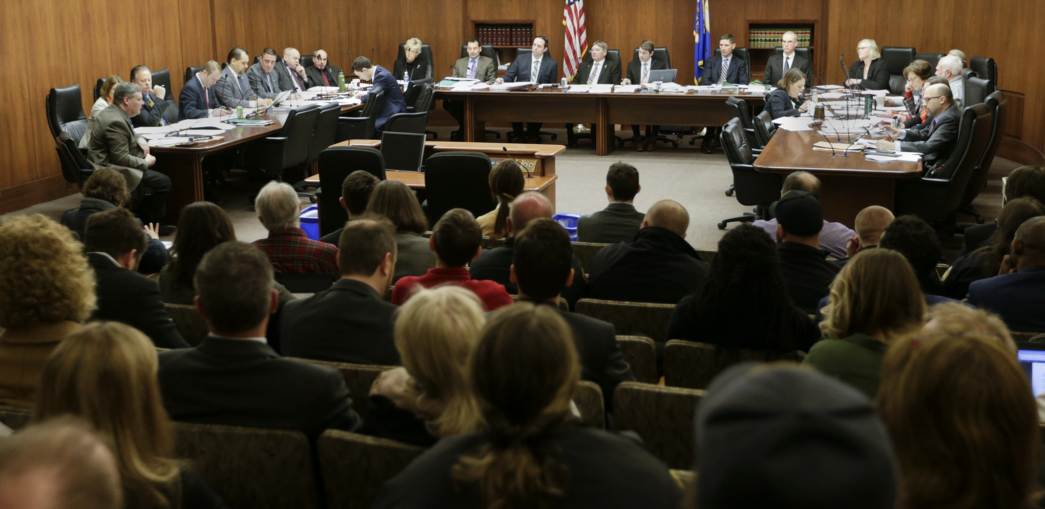 Members of the House Public Safety and Security Policy and Finance Committee debate a series of amendments to HF2856, the omnibus public safety and security bill, April 18. Photo by Paul Battaglia