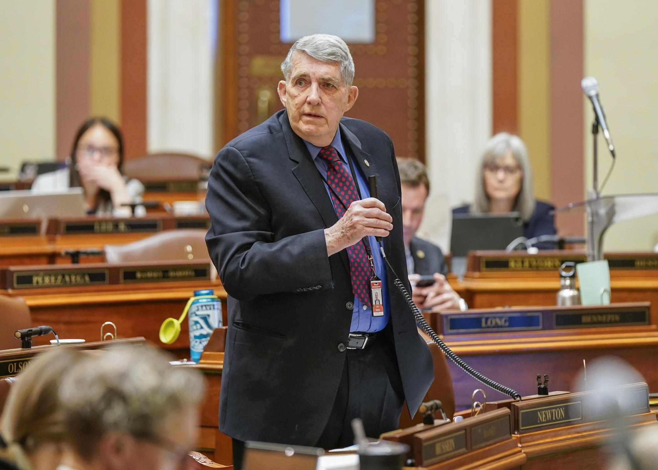 Rep. Jerry Newton introduces HF1937, the omnibus veterans and military affairs finance bill, on the House Floor April 18. (Photo by Catherine Davis)