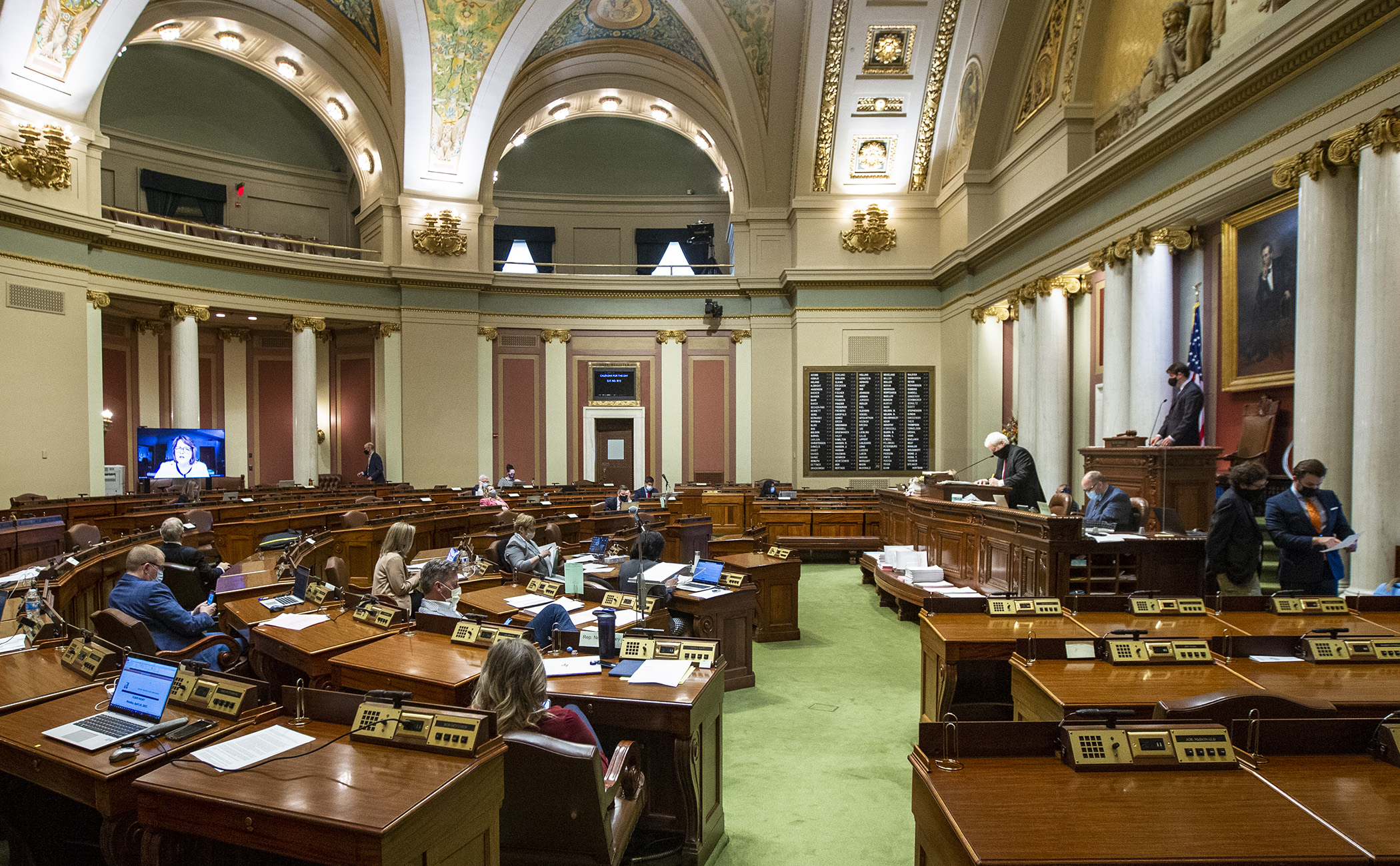 House members listen to discussion of the omnibus higher education finance and policy bill during floor debate April 19. Photo by Paul Battaglia