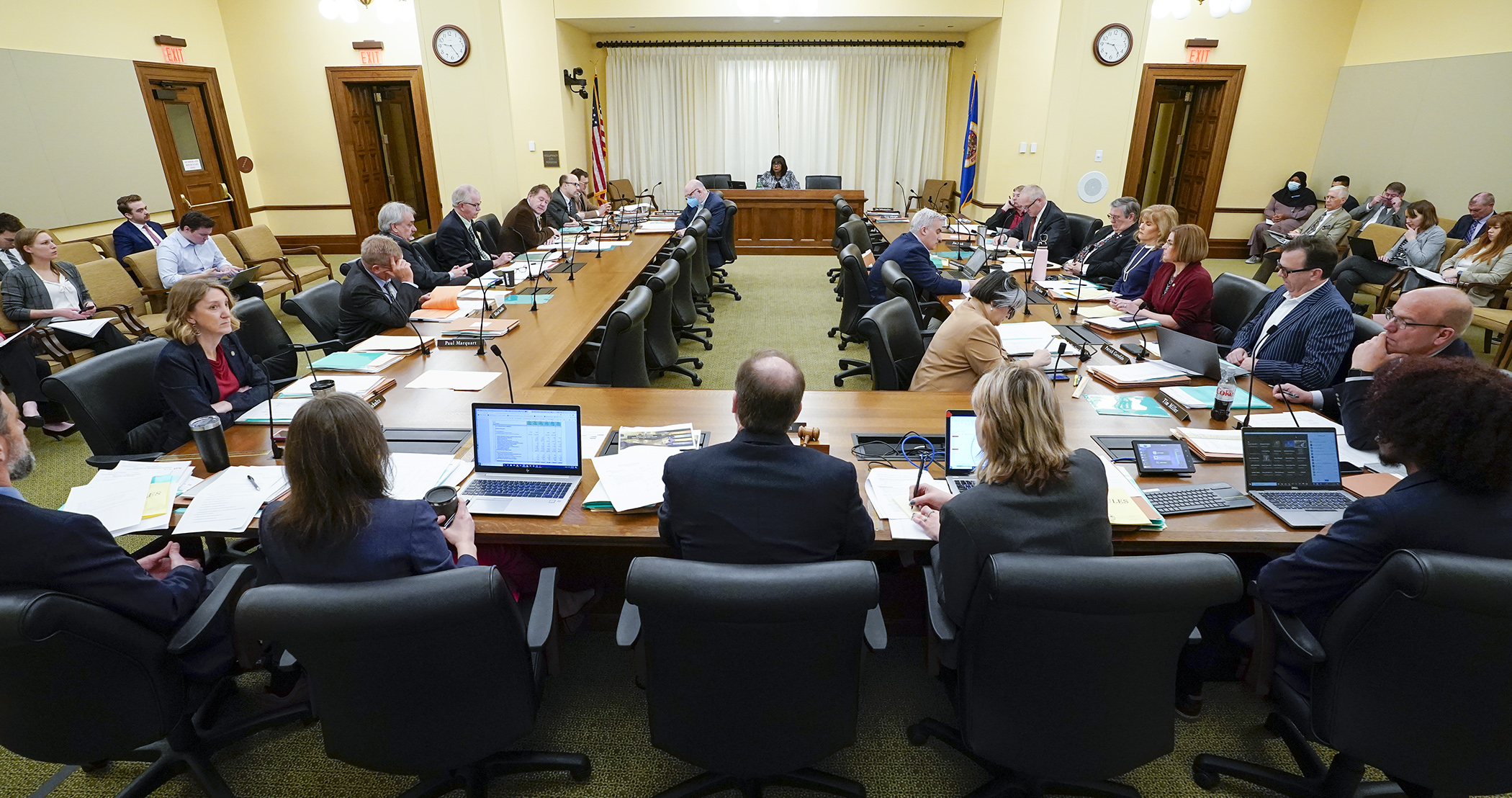 Members of the House Ways and Means Committee listen as Rep. Rena Moran, the committee chair, presents the House budget resolution during a hybrid committee meeting April 19. Photo by Paul Battaglia