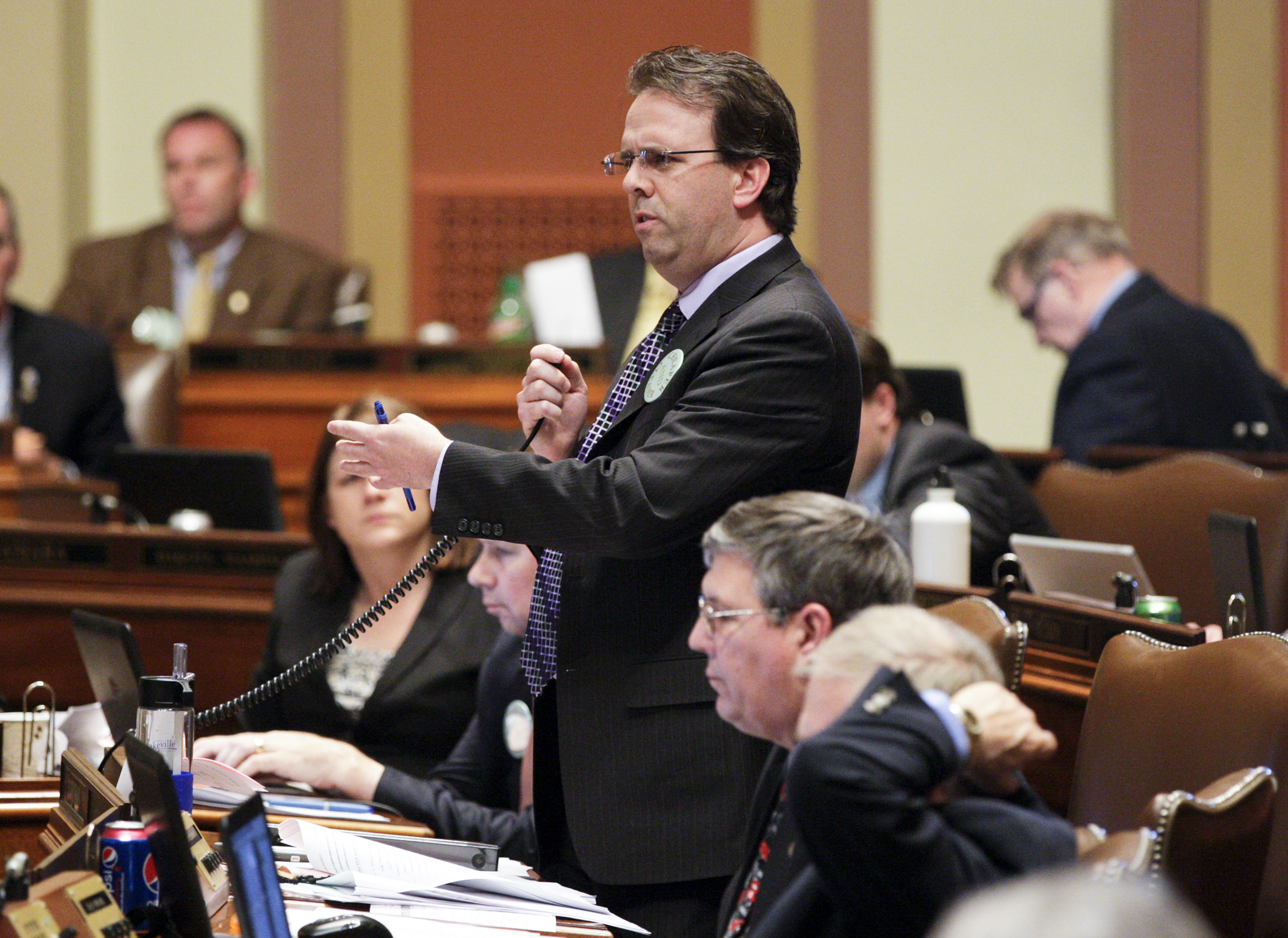 Rep. Pat Garofalo, chair of the House Job Growth and Energy Affordability Policy and Finance Committee, answers a question during debate on the omnibus job growth and energy affordability finance bill April 22. Photo by Paul Battaglia