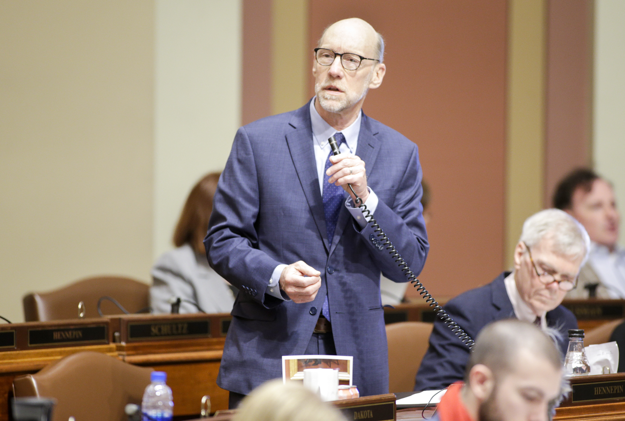 Rep. Jim Davnie, chair of the House Education Finance Division, outlines provisions of HF2400, the omnibus education finance bill, during the April 23 floor debate. Photo by Paul Battaglia
