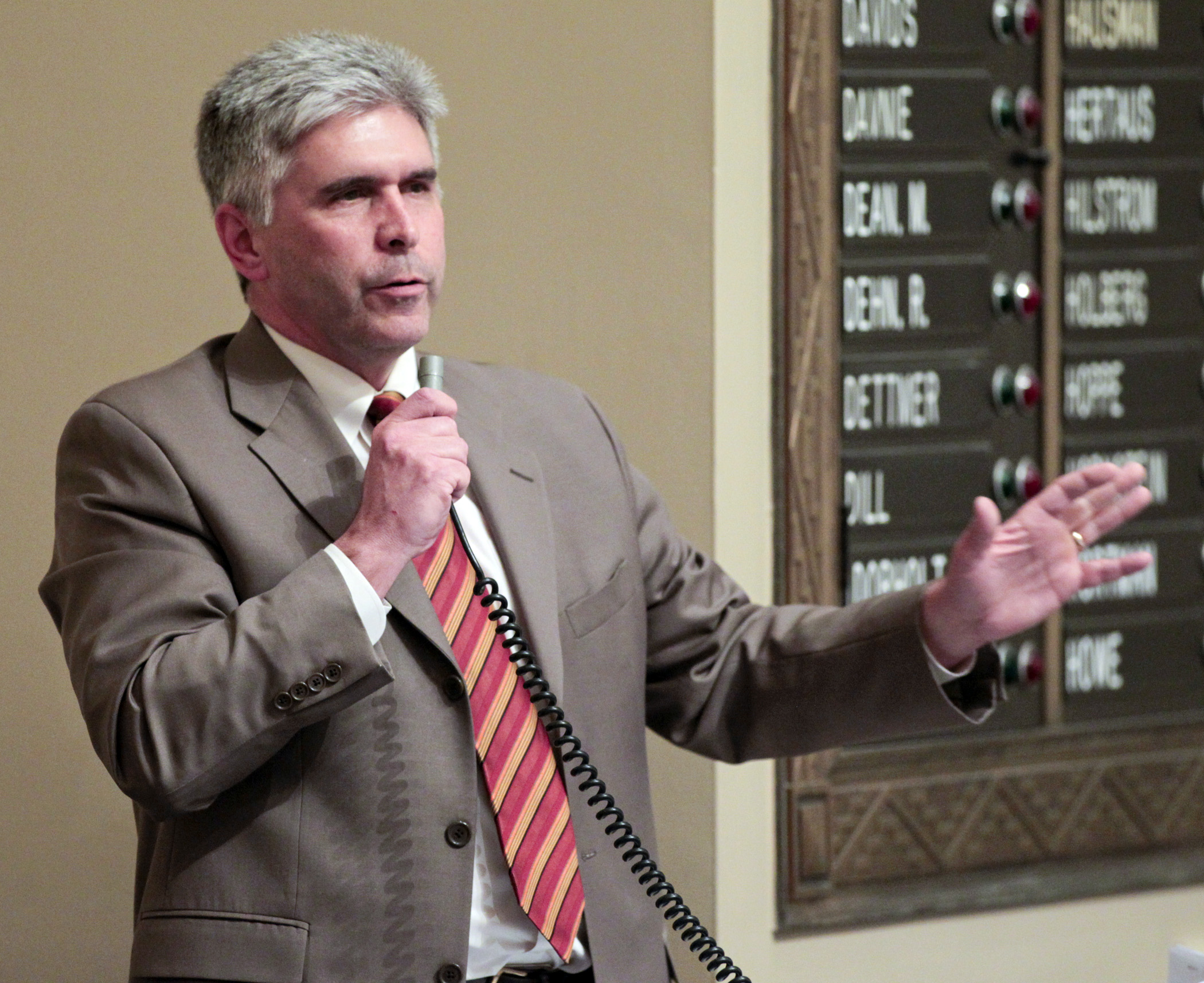 Rep. Joe Atkins makes closing comments on his bill, HF2293, which would regulate consumer short-term lenders during floor debate April 24. Photo by Paul Battaglia