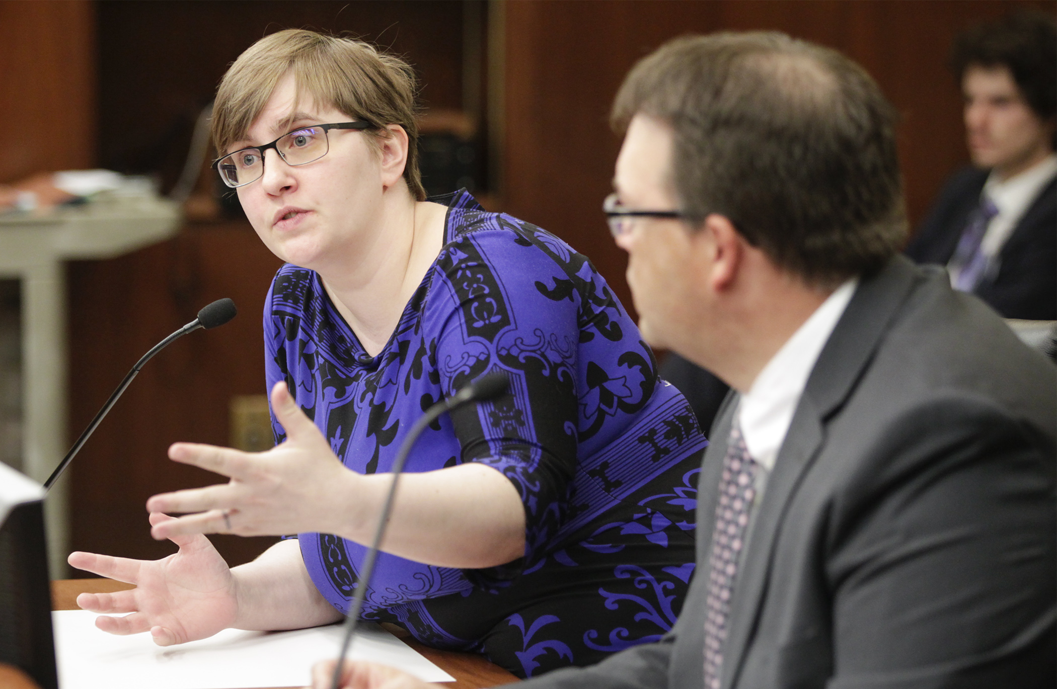 Betsy Talbot, the Office of Higher Education’s manager of instructional registration and licensing, goes through details of HF2849 during an April 26 meeting of the House Higher Education Finance and Policy Division. Photo by Paul Battaglia