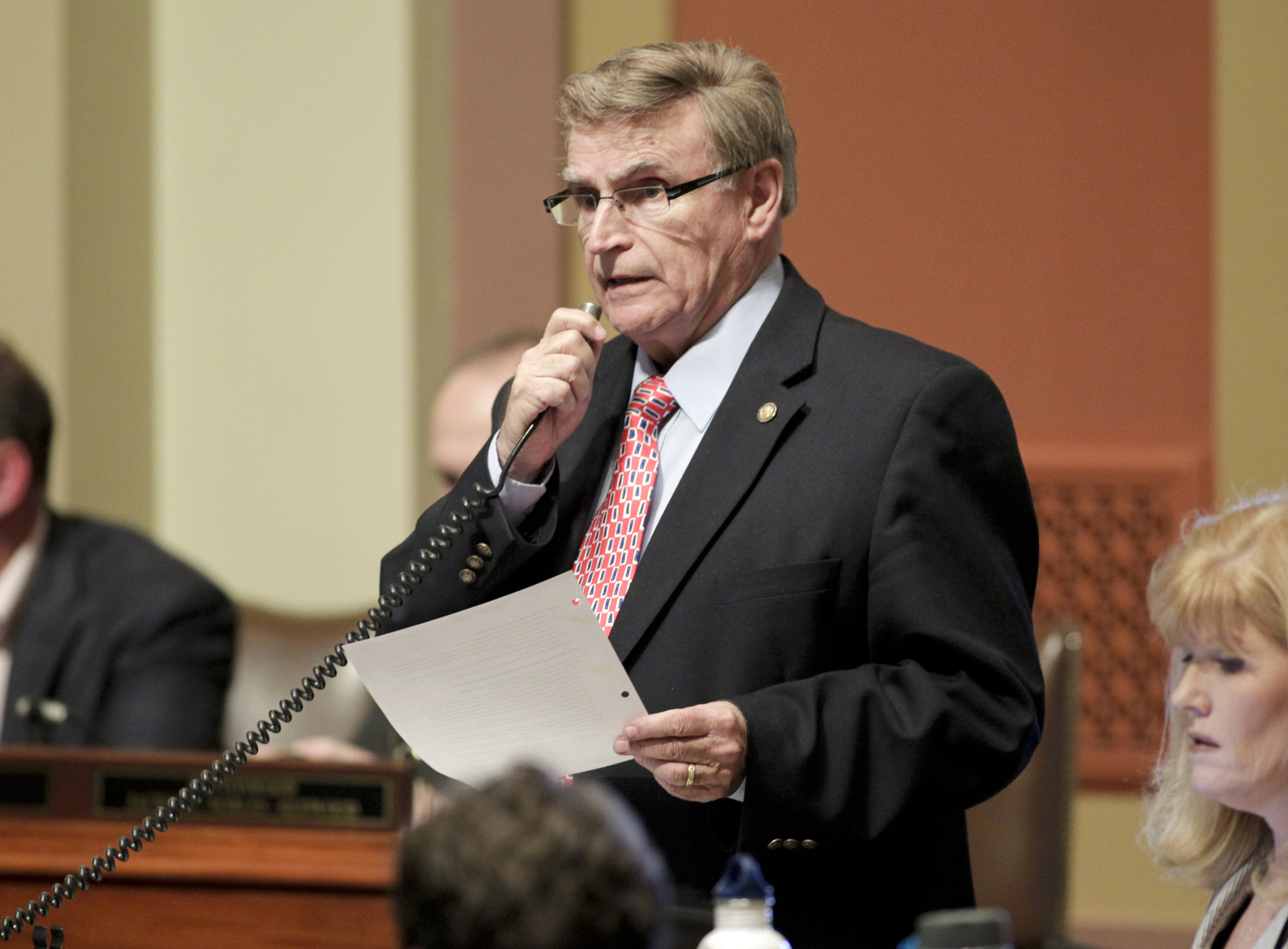 Rep. Bud Nornes, chair of the House Higher Education Policy and Finance Committee, explains provisions of the omnibus higher education policy and finance bill, SF5, during debate on the House Floor April 27. Photo by Paul Battaglia