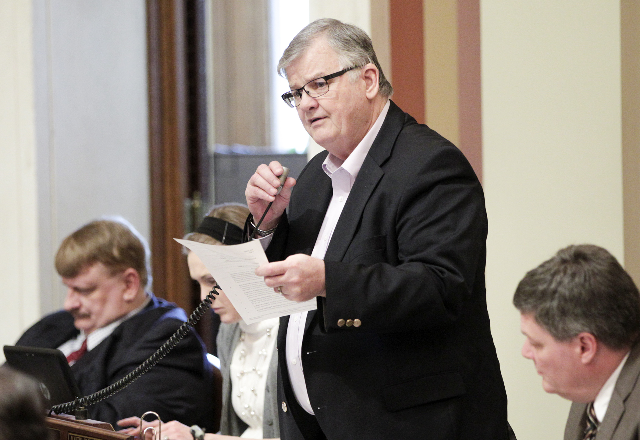 Rep. Bob Gunther describes the omnibus legacy finance bill April 30 on the House Floor. The bill passed 128-0. Photo by Paul Battaglia