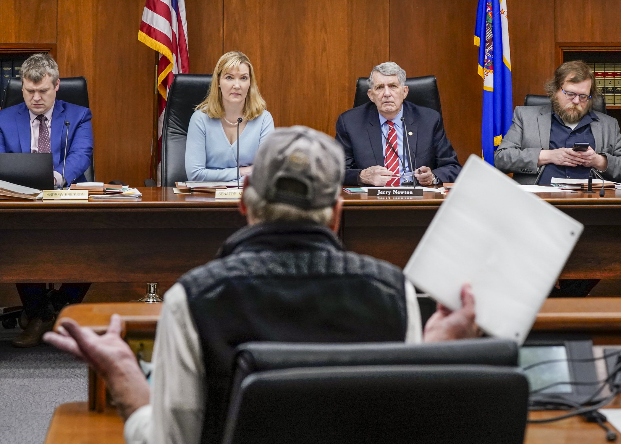 Co-chairs of the omnibus veterans and military affairs finance bill conference committee, Sen. Nicole Mitchell and Rep. Jerry Newton, listen to a public testifier May 1. (Photo by Catherine Davis)