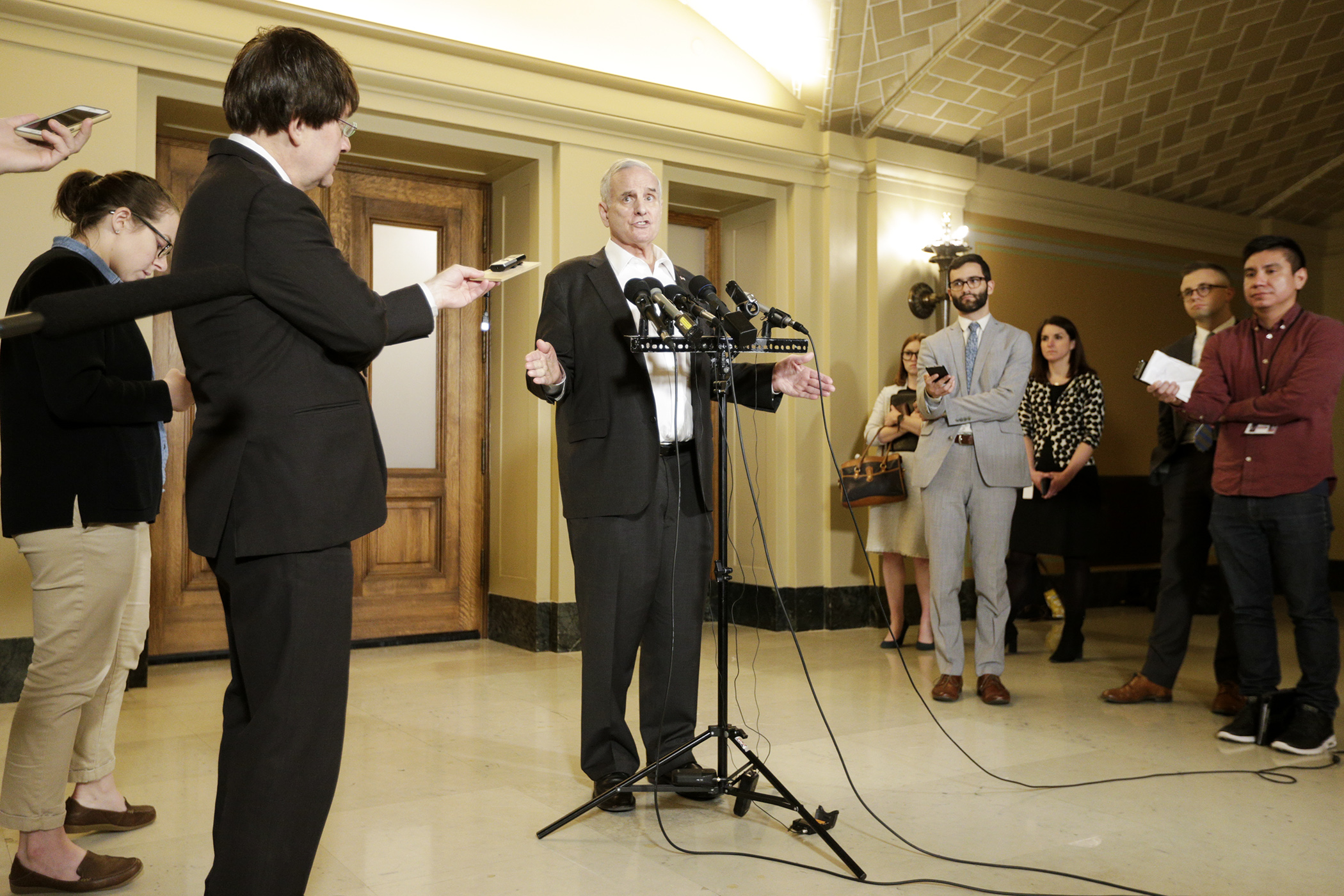 Gov. Mark Dayton addressed the media May 4 after meeting with legislative leaders to negotiate a budget deal. Photo by Paul Battaglia