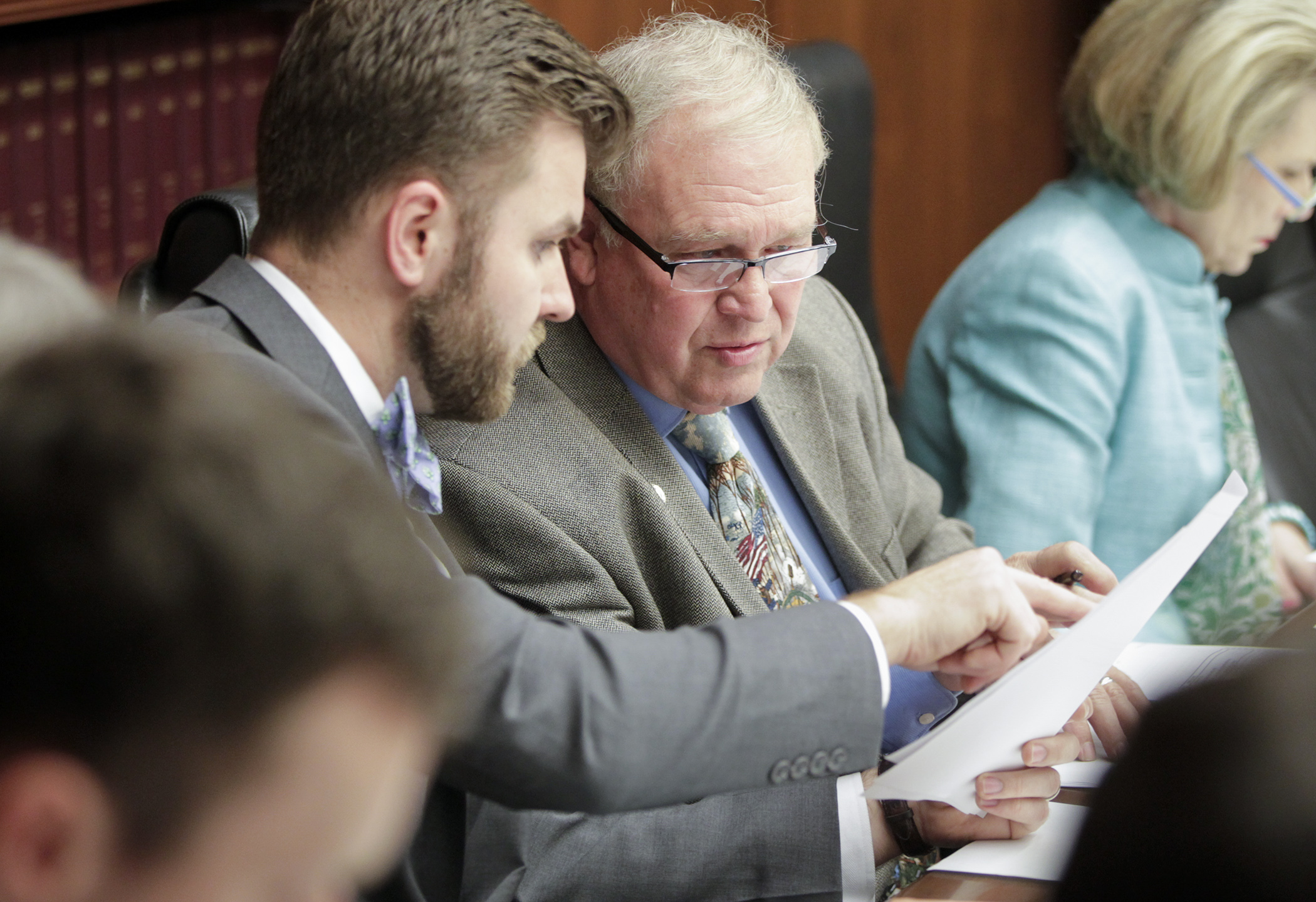 Rep. Dean Urdahl, chair of the House Capital Investment Committee, confers with Committee Administrator Gavin Hanson May 4 as the committee begins to take public testimony on its omnibus bill. Photo by Paul Battaglia