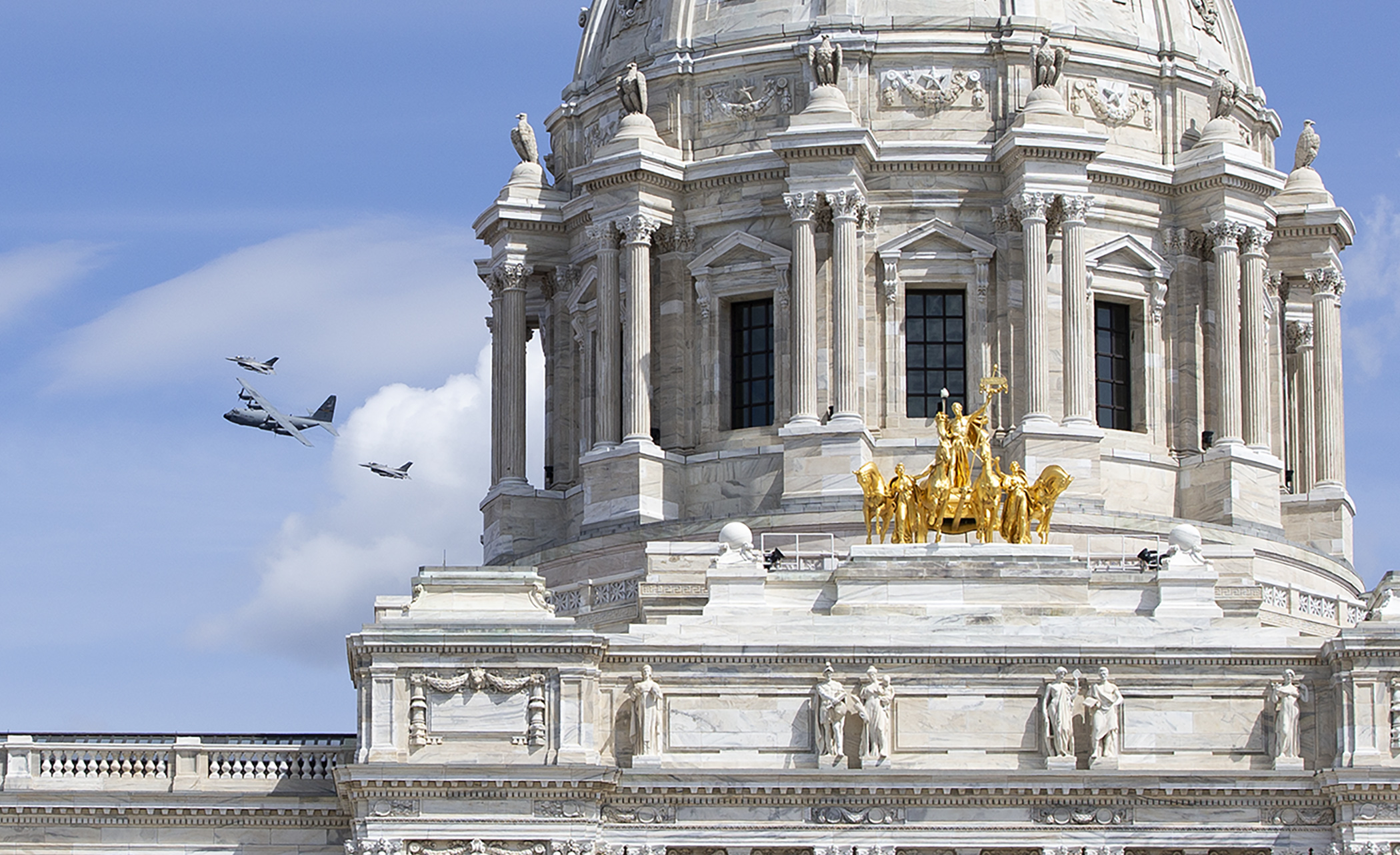 Aircraft from the Minnesota National Guard fly by the Capitol May 6, in recognition of medical workers on the frontlines of the COVID-19 pandemic response. Photo by Paul Battaglia
