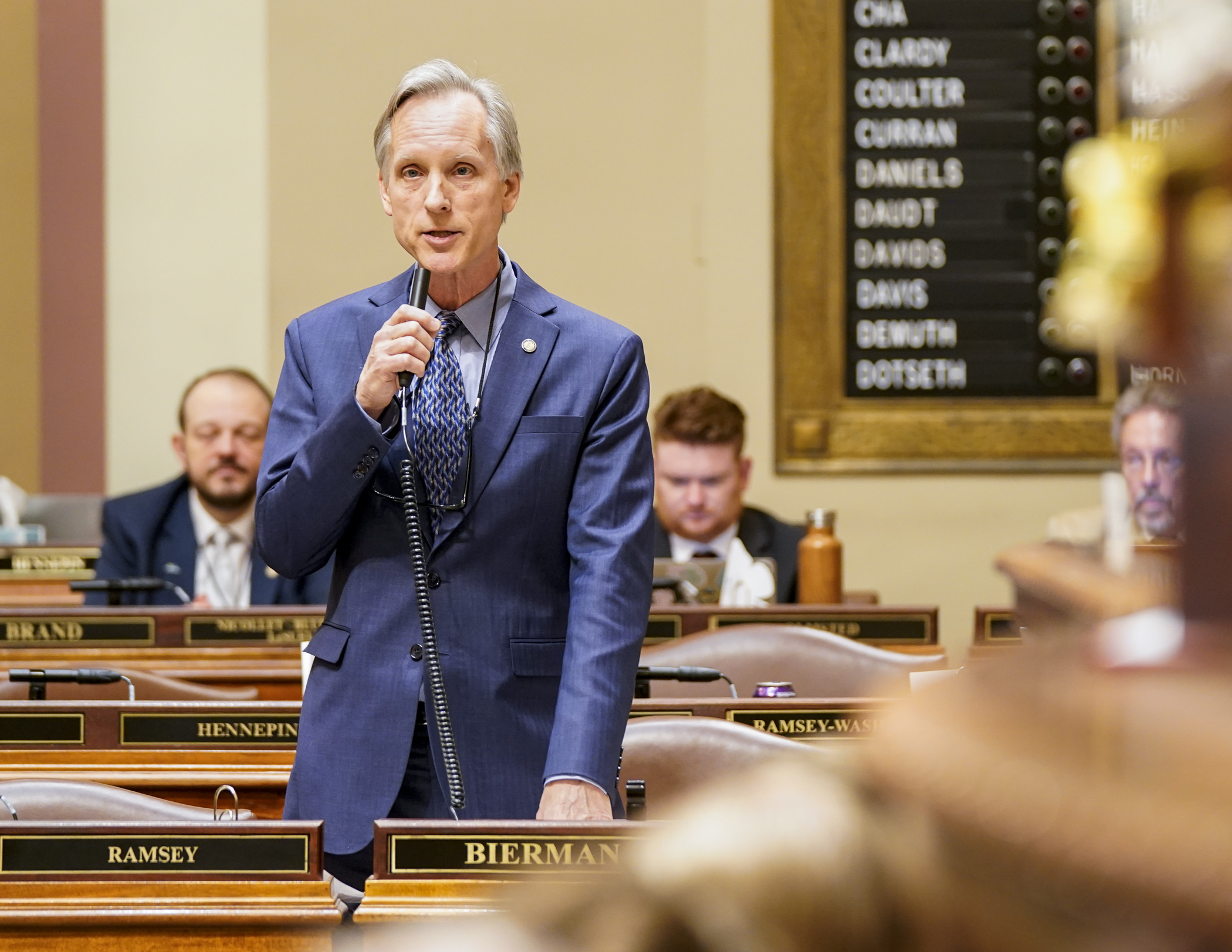 Rep. Robert Bierman outlines HF402, a bill that would add oversight to mergers of public health care systems, May 8. (Photo by Catherine Davis)