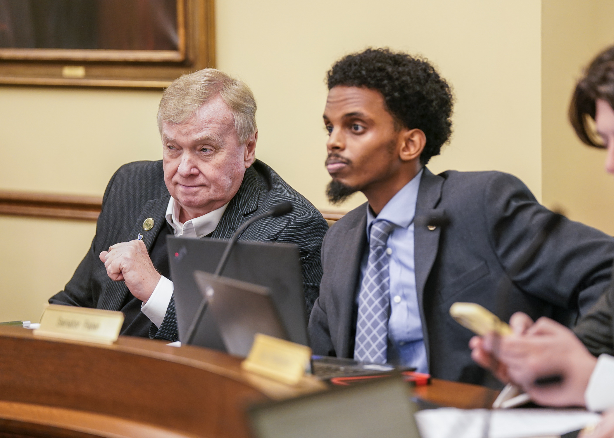 Co-chairs Rep. Gene Pelowski Jr. and Sen. Omar Fateh listen May 9 to a review of the higher education conference committee report. (Photo by Catherine Davis)