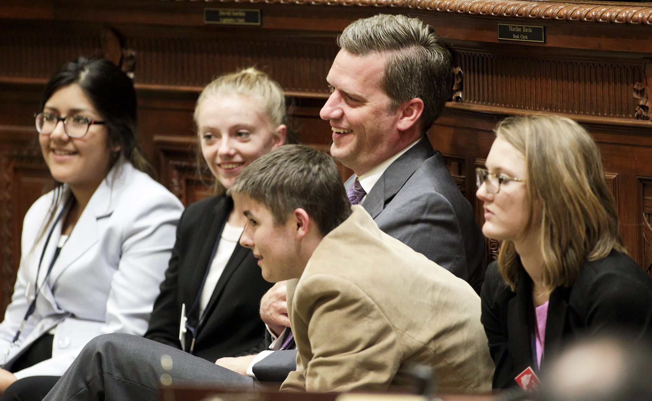 House Speaker Kurt Daudt talks with a group of high school pages during floor session May 11. House Photography file photo