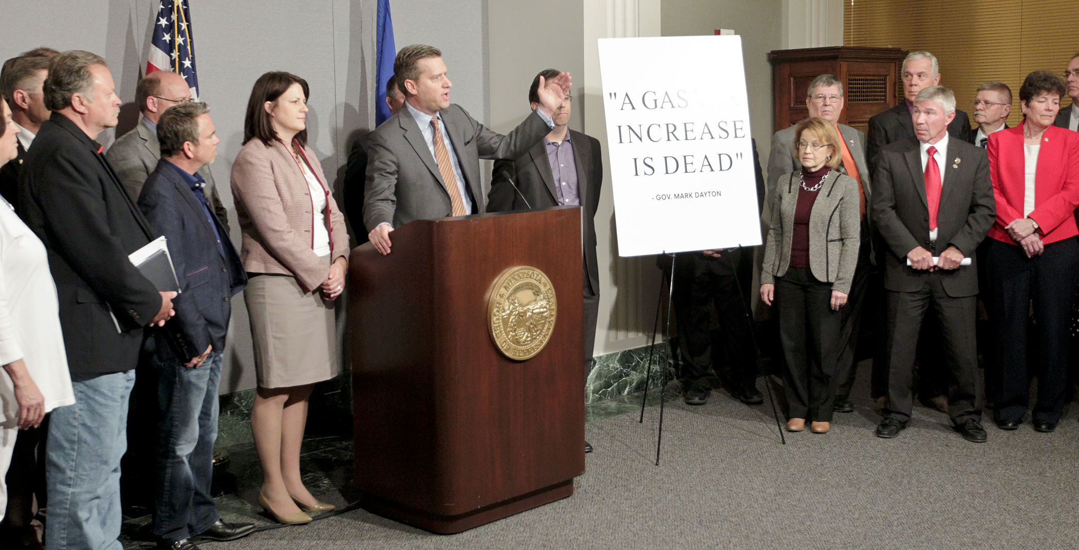Standing next to a poster with a quote from Gov. Mark Dayton, House Speaker Kurt Daudt and members of the Republican caucus urge the governor to put forth a transportation funding plan that does not increase the gas tax. Photo by Paul Battaglia