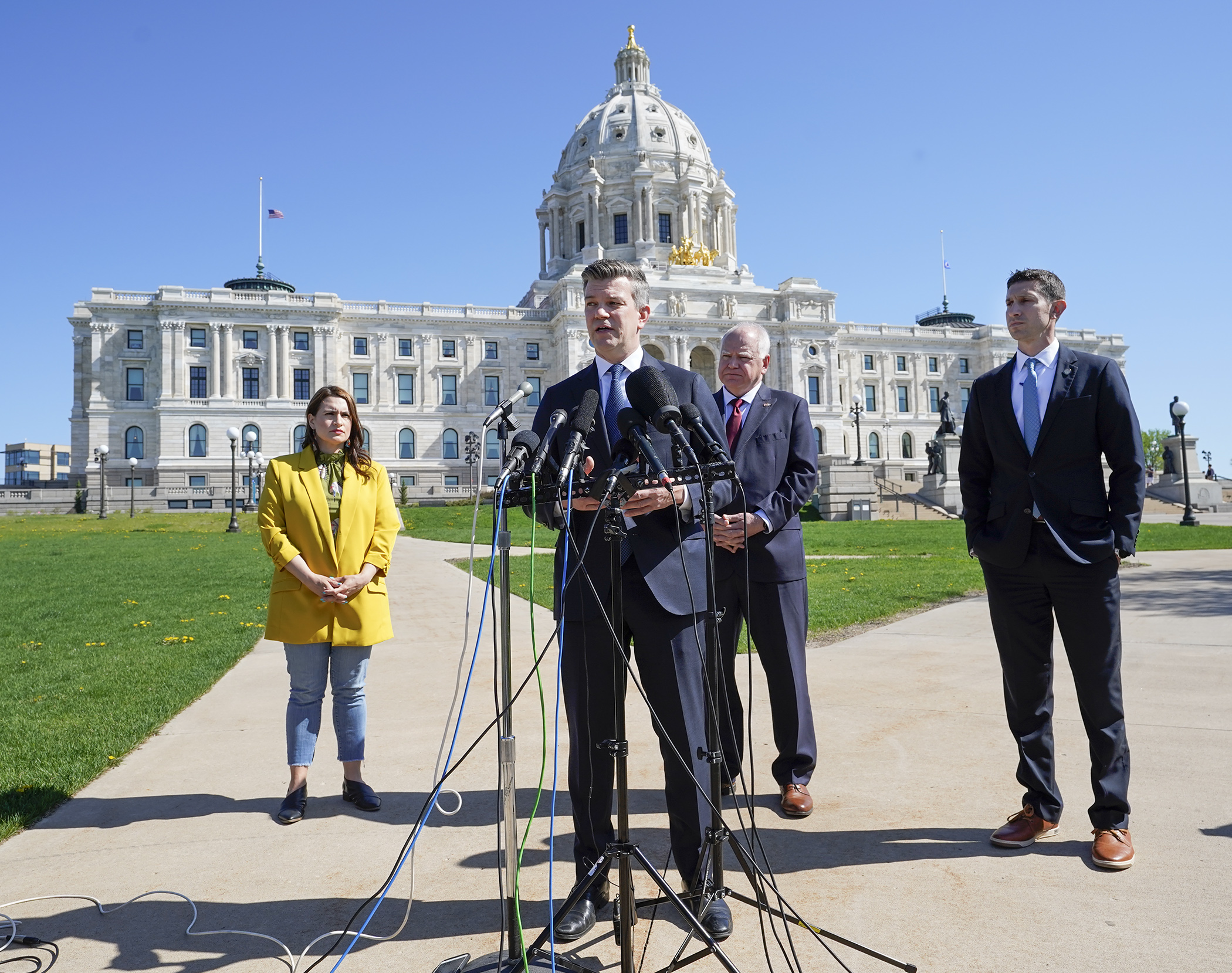 House Majority Leader Ryan Winkler, Senate Majority Leader Jeremy Miller, Gov. Tim Walz, and Lt. Gov. Peggy Flanagan announce a framework for a budget agreement, paving the way to the end of the legislative session. (Photo by Paul Battaglia)