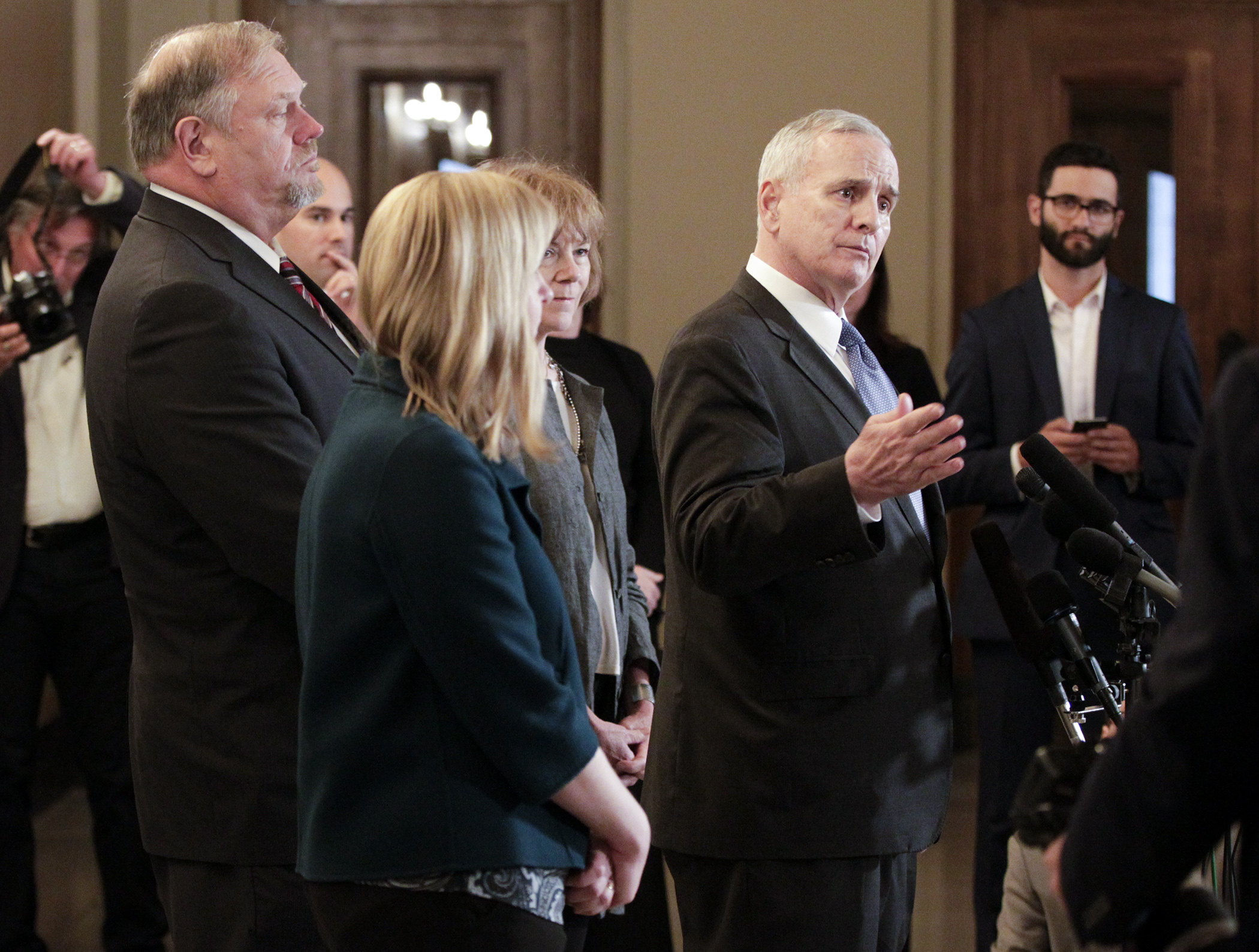 Gov. Mark Dayton and DFL leaders speak to the media after meeting with Republican leaders May 17 in hopes of reaching a budget agreement. Photo by Paul Battaglia