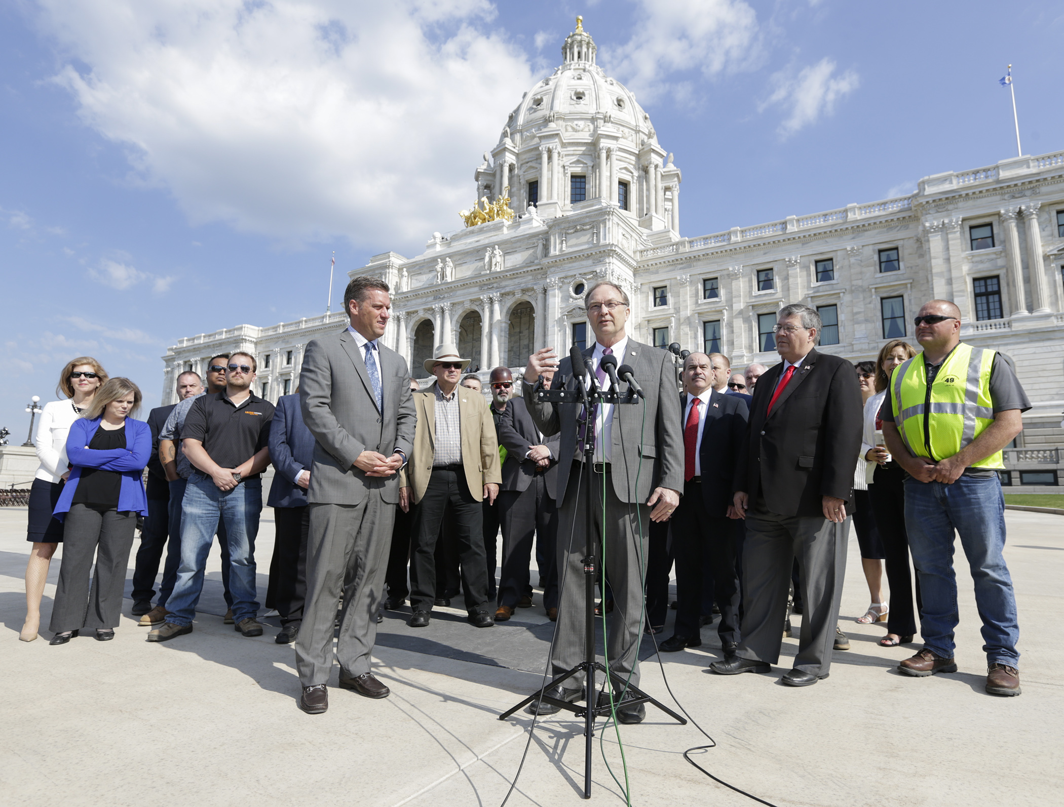 House Transportation Finance Committee chair Rep. Paul Torkelson is joined by a group of Republican House members and labor union members May 17 as he previews the House Floor vote on HF4437. Photo by Paul Battaglia