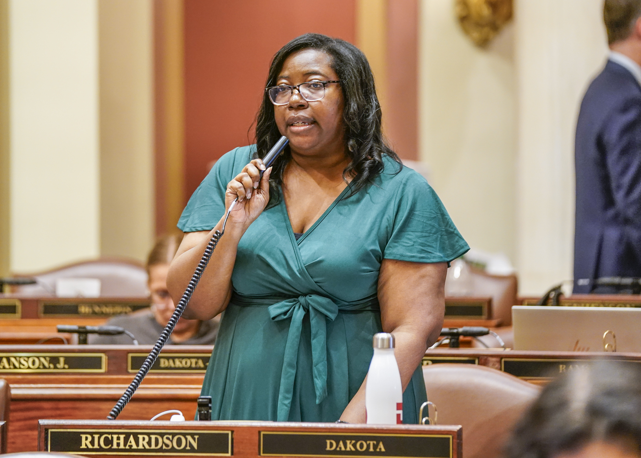 Rep. Ruth Richardson urges her colleagues to vote Wednesday for the conference committee report on HF2, a bill to create a statewide family and medical benefit insurance program. (Photo by Catherine Davis)