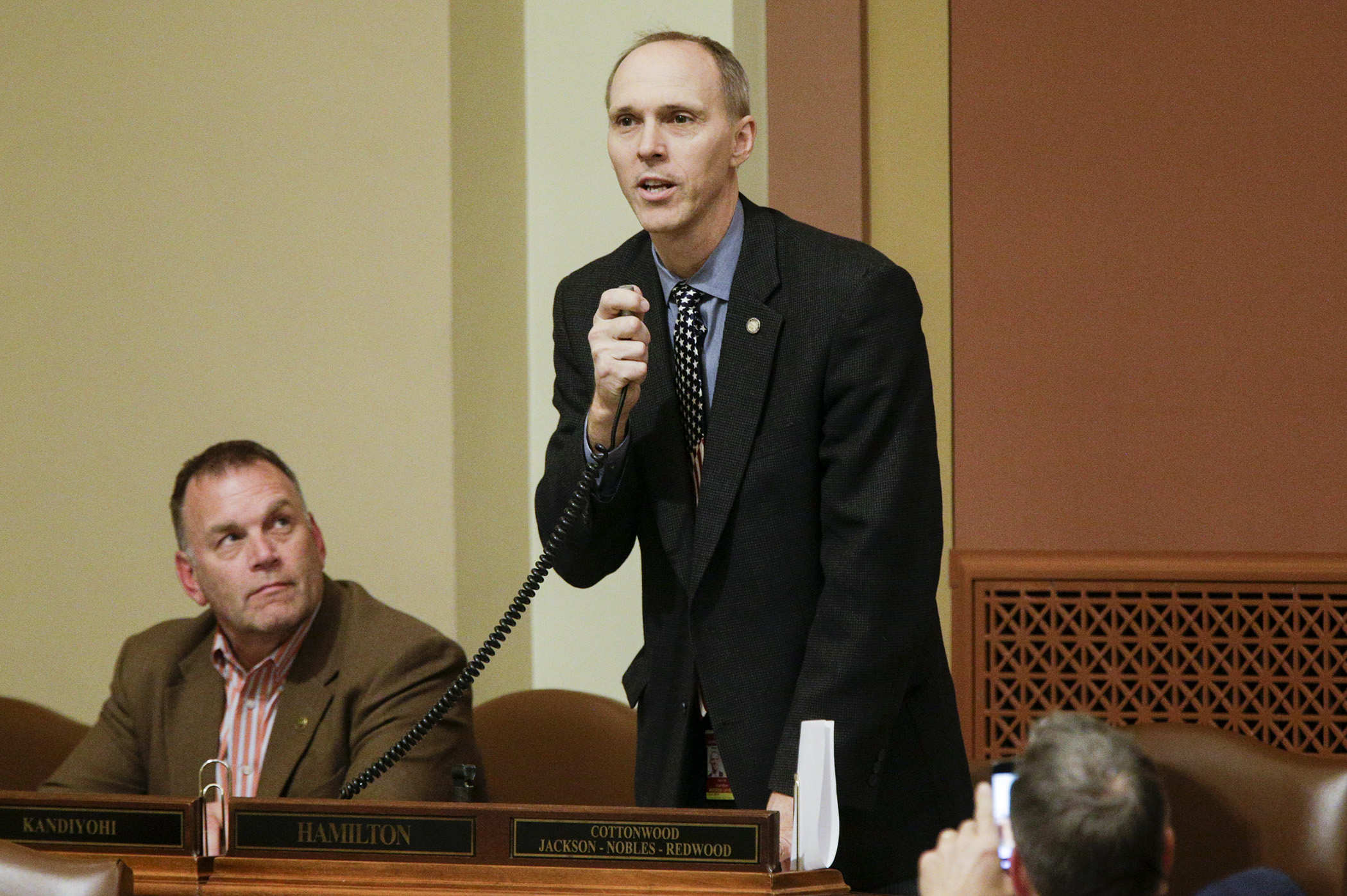 Rep. Rod Hamilton, the House sponsor of the omnibus agriculture finance bill, speaks during floor debate on the conference committee report on HF1545. The report passed the House 124-5. Photo by Paul Battaglia