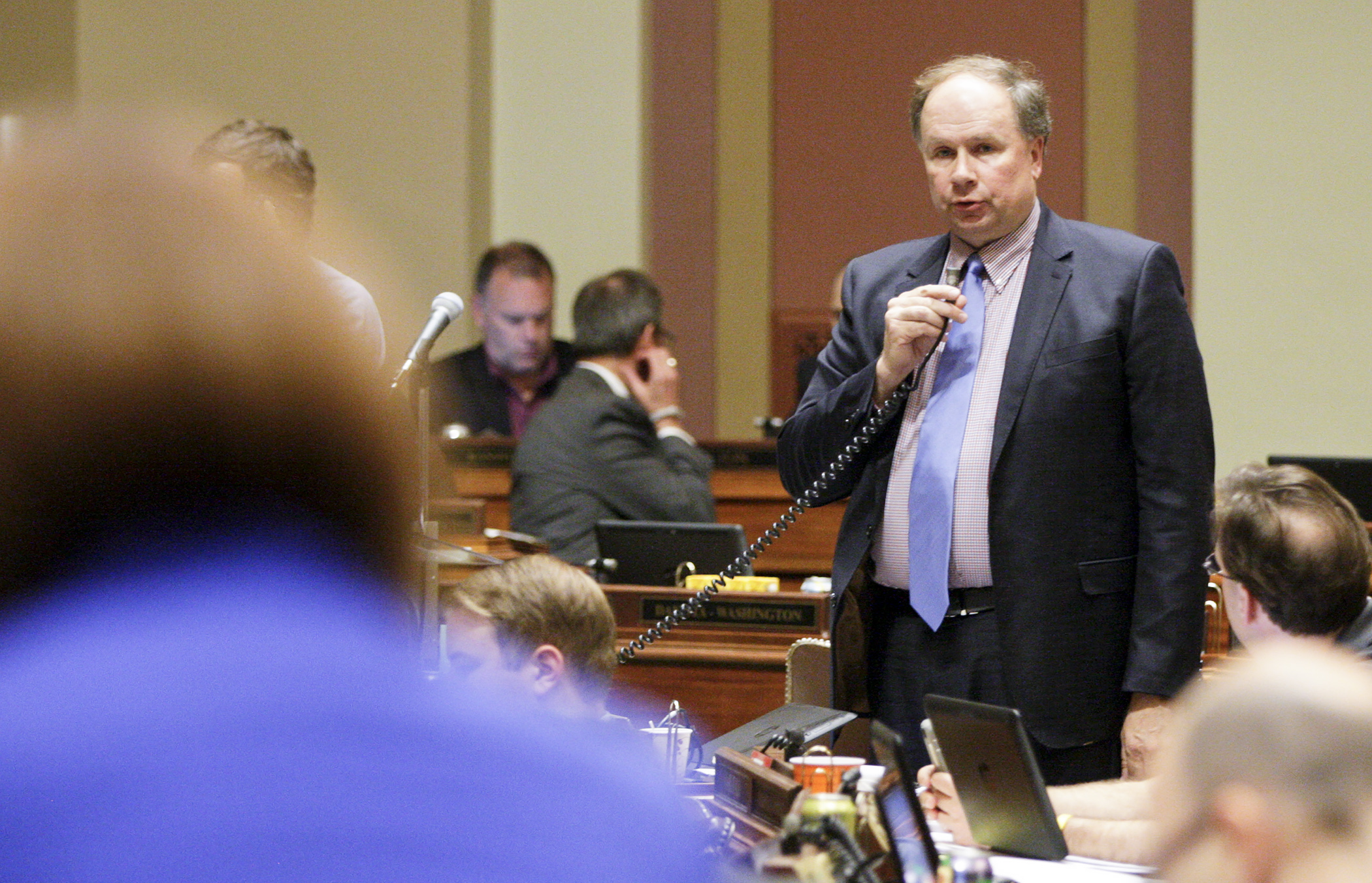 Rep. Jim Knoblach answers a question from Rep. Tina Liebling during discussion of the supplemental spending bill May 22. Photo by Paul Battaglia