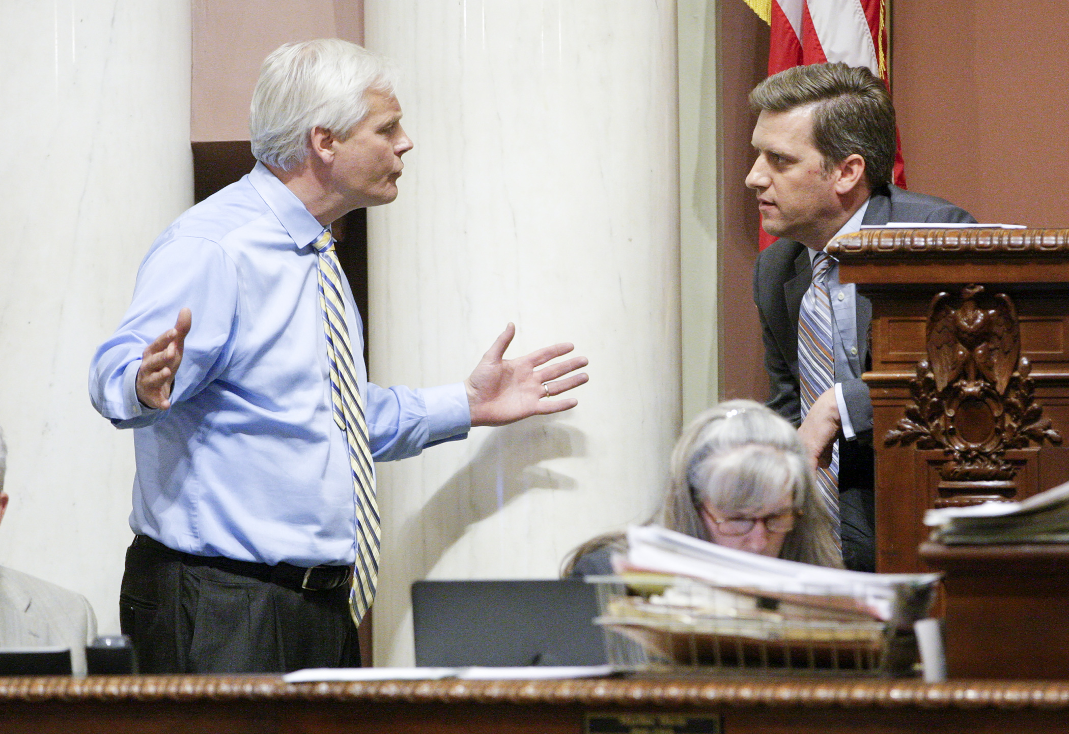 House Minority Leader Paul Thissen, left, and House Speaker Kurt Daudt have a heated discussion during May 22 debate of the omnibus capital investment bill. Photo by Paul Battaglia