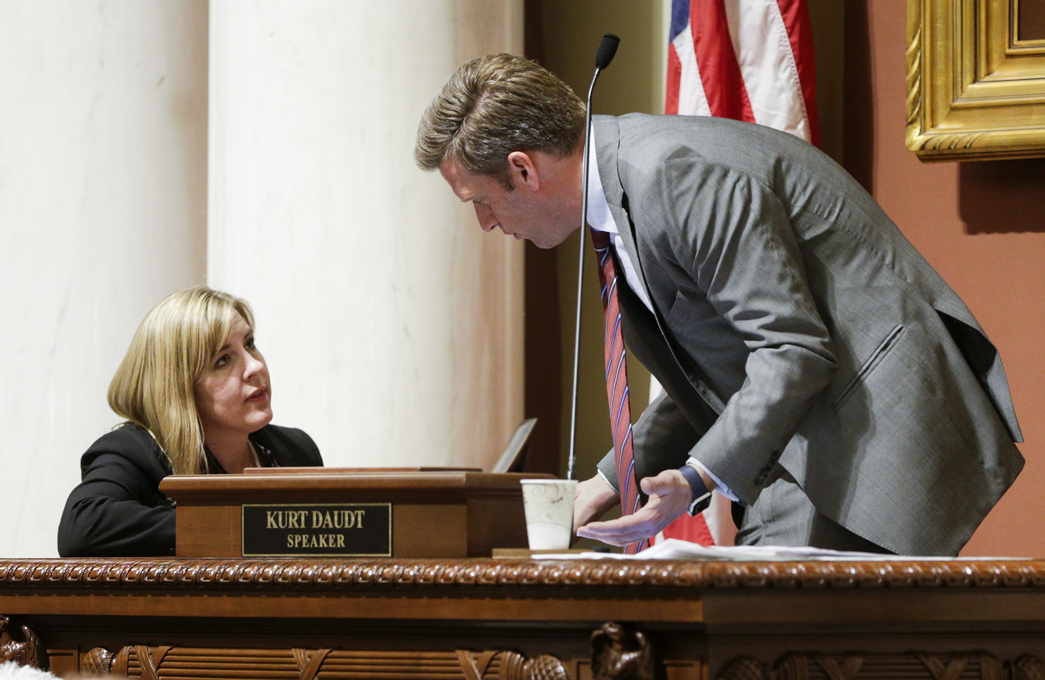 House Speaker Kurt Daudt and House Minority Leader Melissa Hortman confer during the May 24 House Floor debate. Photo by Paul Battaglia