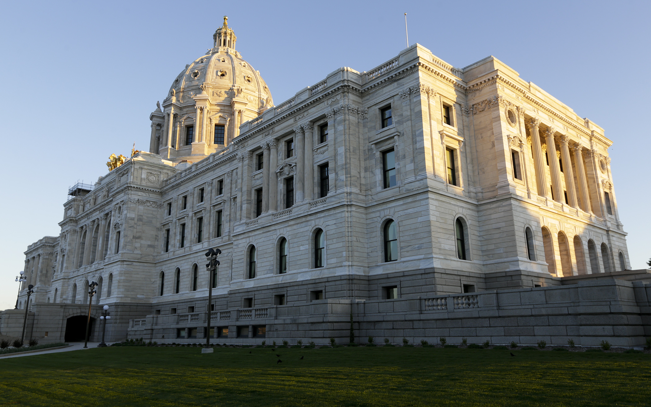 The sun rises on the Capitol as the House debates the special session omnibus education finance bill May 24. Photo by Paul Battaglia