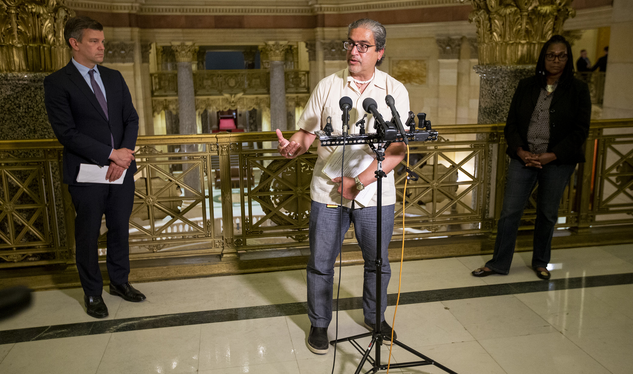 Rep. Carlos Mariani speaks to the media at an early morning press conference regarding the counter offer the House made to the Senate on law enforcement accountability in an effort to reach a compromise. Photo by Paul Battaglia