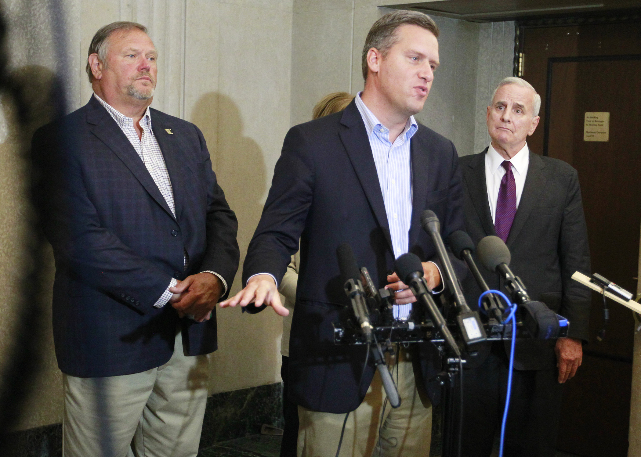 House Speaker Kurt Daudt, voices optimism at the prospect of a special session after meeting with Gov. Mark Dayton, right, Lt. Gov. Tina Smith (not pictured) and Senate Majority Leader Tom Bakk, left, July 15. Photo by Paul Battaglia
