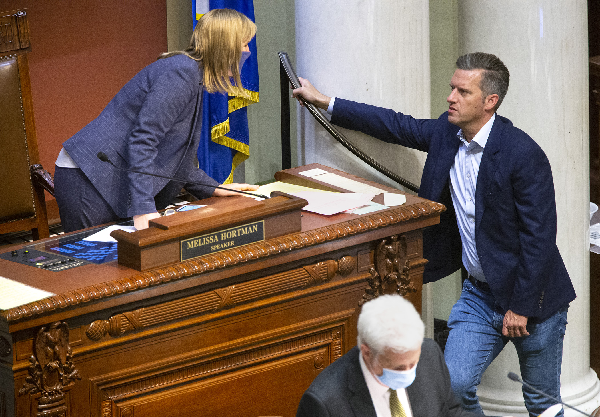 House Speaker Melissa Hortman and House Minority Leader Kurt Daudt confer during the early morning hours of floor session July 21. Photo by Paul Battaglia