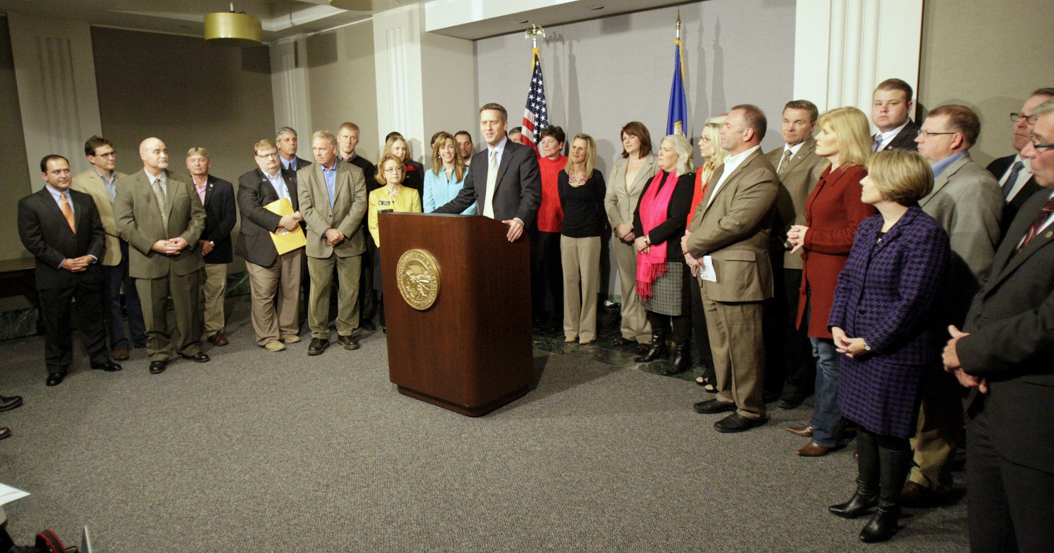 House Minority Leader Kurt Daudt answers questions at a post-election news conference, surrounded by many members of the new House majority party. Republicans will have a 72-62 seat advantage in the House for the 2015-16 biennium. Photo by Paul Battaglia