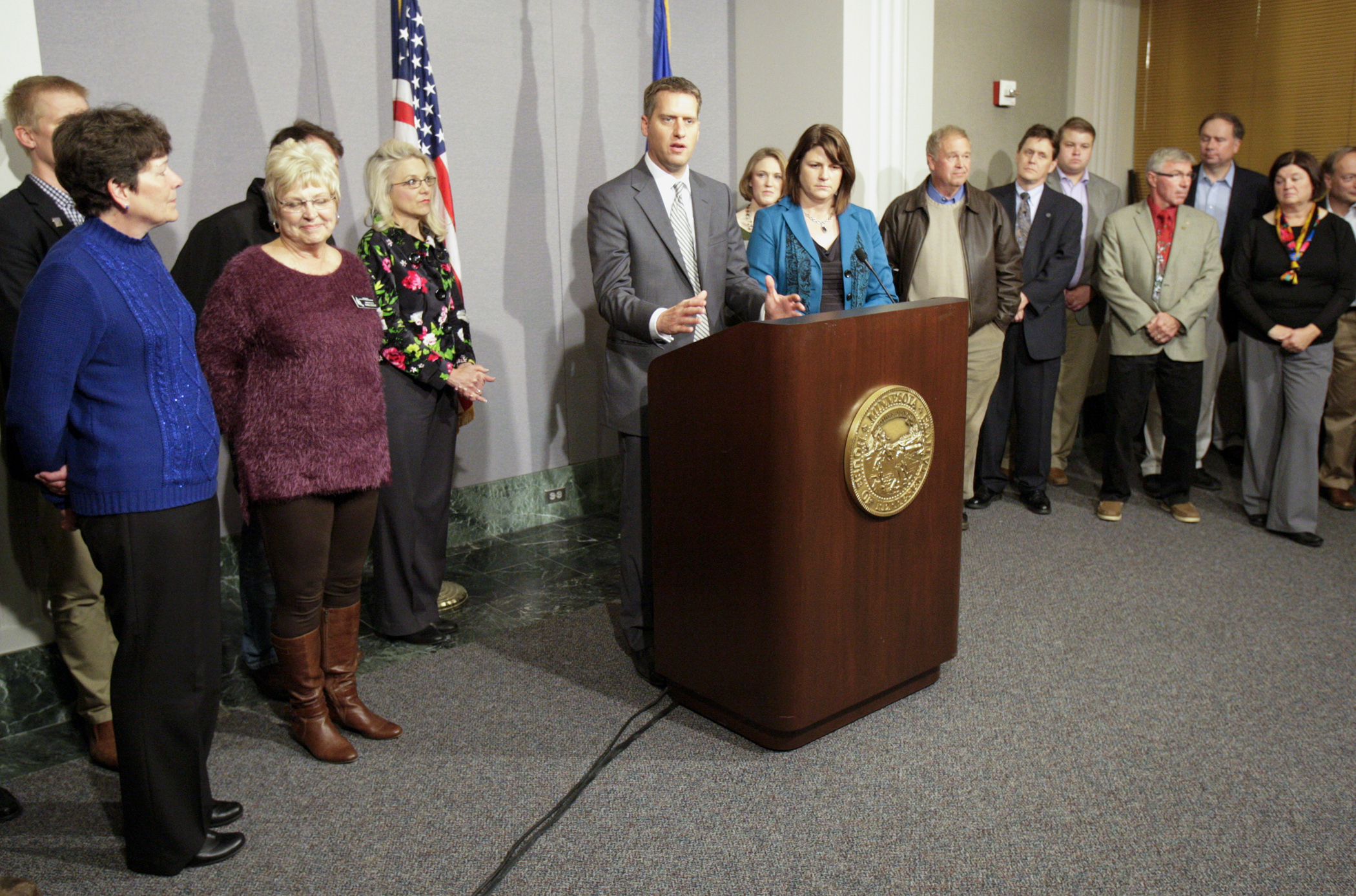 House Speaker-designate Kurt Daudt and House Majority Leader-elect Joyce Peppin are surrounded by members of the Republican caucus at a Nov. 7 news conference after their leadership elections. Photo by Paul Battaglia