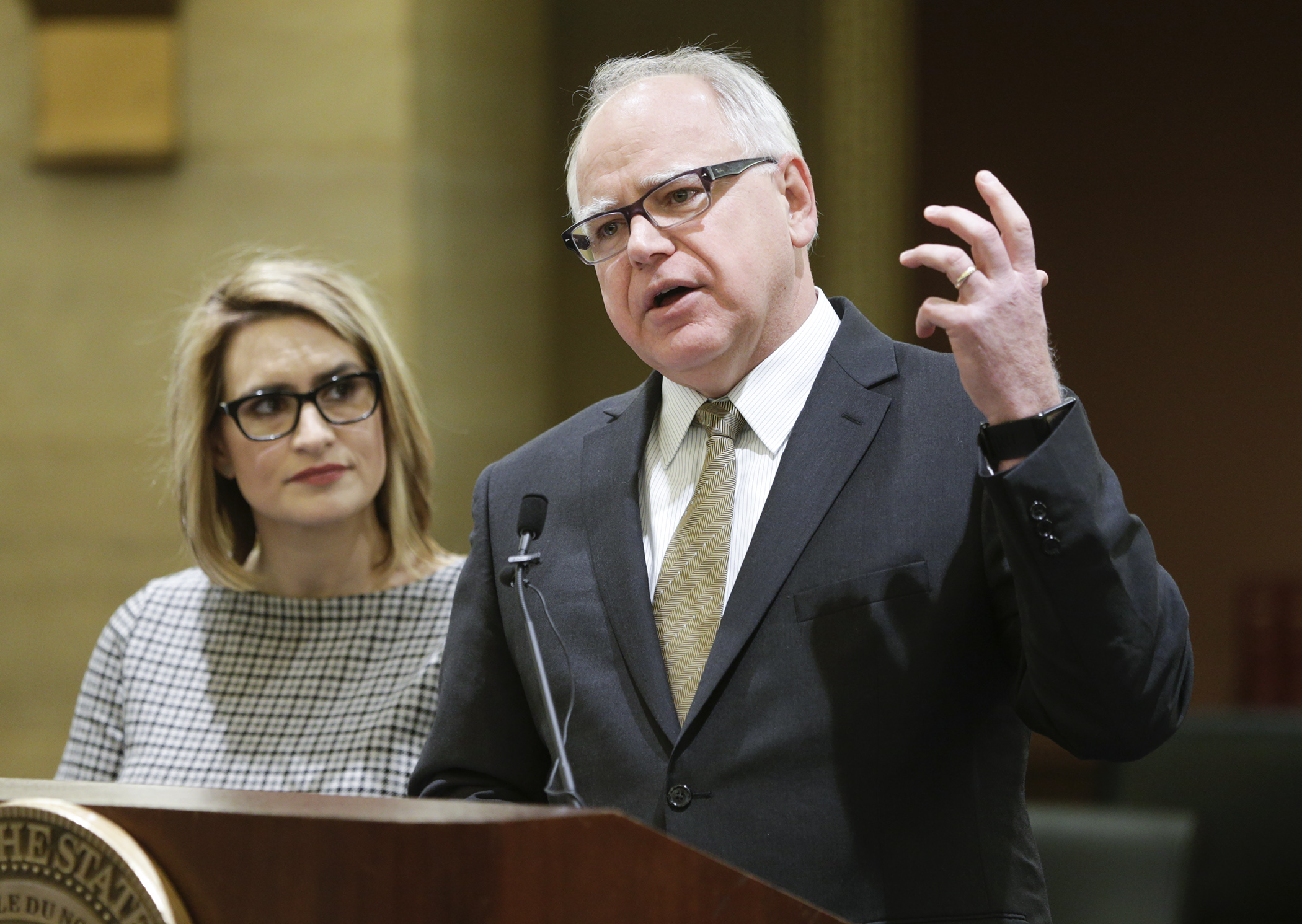 Gov.-elect Tim Walz, right, comments after the presentation on the state’s budget and economic forecast Dec. 6, which projects a $1.54 billion surplus over the next two years. Lt. Gov.-elect Peggy Flanagan looks on. Photo by Paul Battaglia