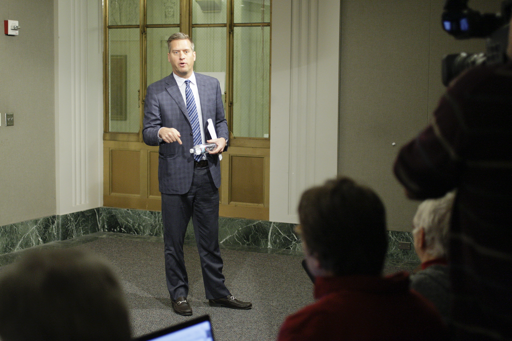 House Speaker Kurt Daudt pauses as he exits a morning news conference to address ongoing special session negotiations with Gov. Mark Dayton on Dec. 16. Photo by Paul Battaglia