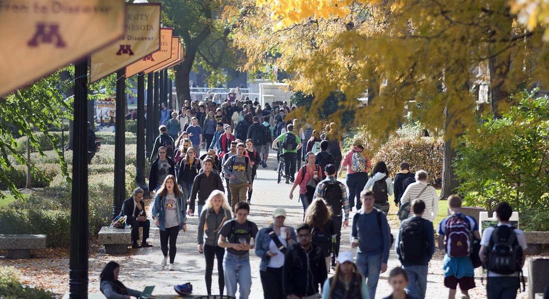 Students walk between classes on the University of Minnesota's Minneapolis campus. HF467 would appropriate $7.55 million per year toward emergency assistance for postsecondary students. (House Photography file photo) 
