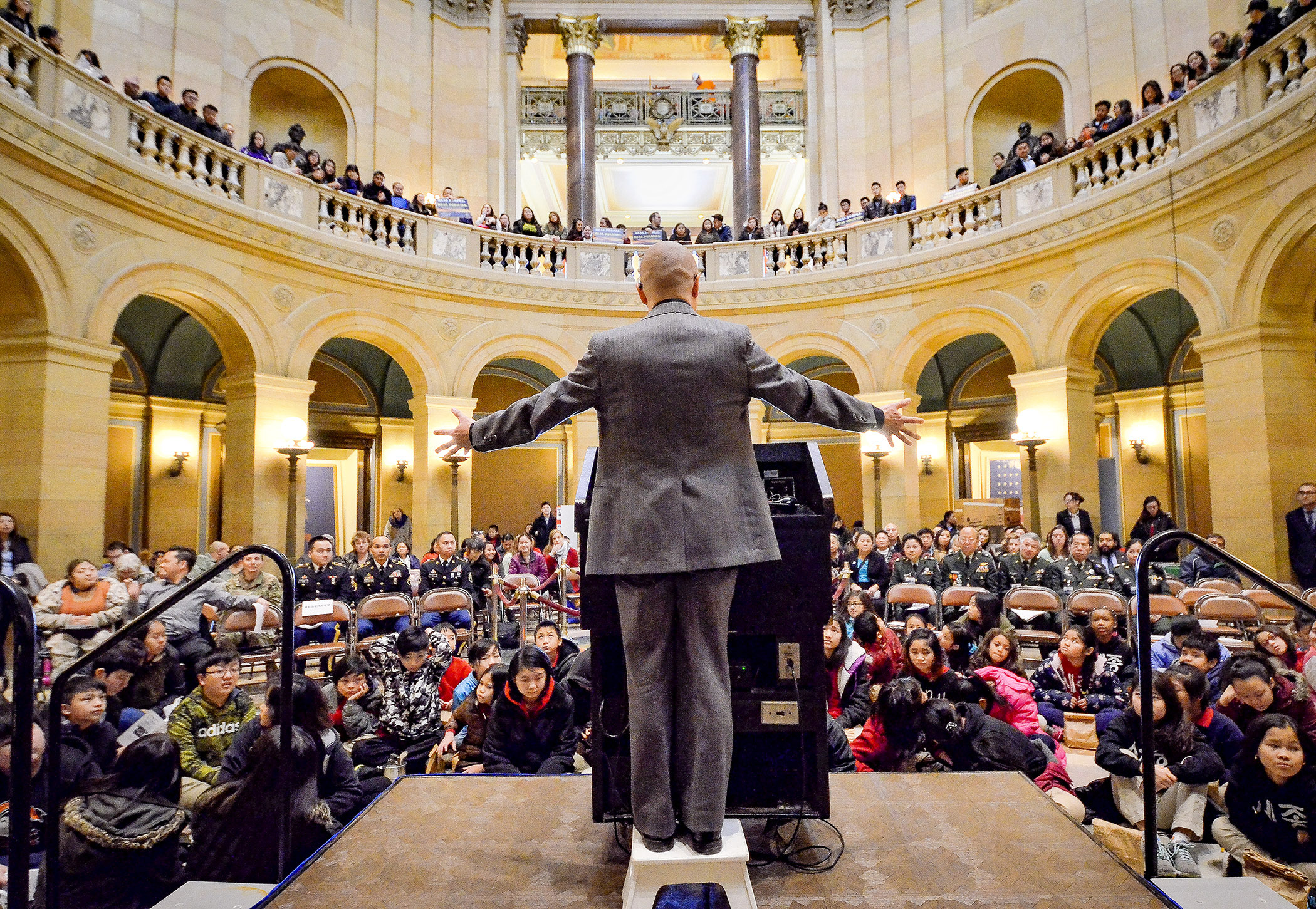 David Maeda, chair of the Council on Asian Pacific Minnesotans Community Board, gives closing remarks to the hundreds of people who gathered in the Capitol Rotunda Feb. 8 for API Day at the Capitol. Photo by Andrew VonBank